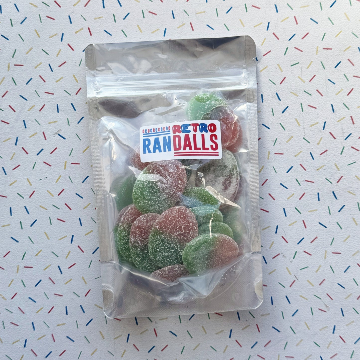 LOVALLS STRAWBERRY SOUR OVALS - 100g (BRITISH)