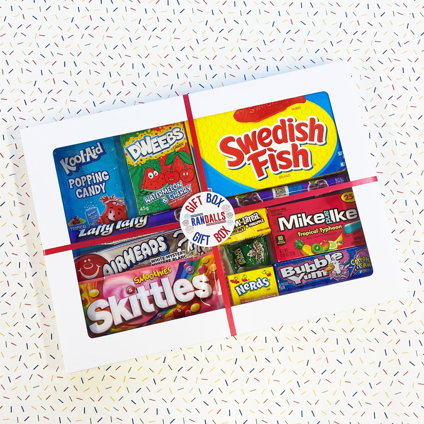 £10 candy variety giftbox, kool-aid popping candy, dweebs watermelon and cherry, swedish fish, airheads white mystery, skittles smoothies, nerds lemon, warheads, now and later pineapple, mike and ike tropical typhoon mini, bubbleyum, candy, sweets, laffy taffy