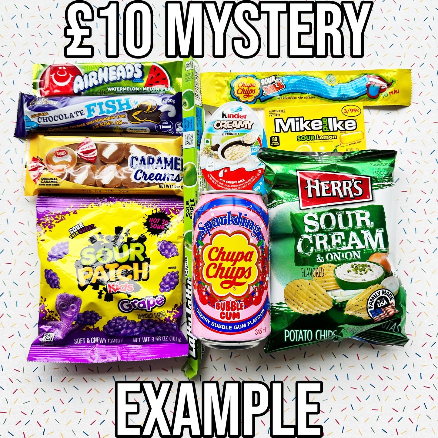 £10 mystery bundle, candy, sweets, chocolate, lollipop, soda, pop, drink, fizzy, crisps, chips, cheese puffs, gift, giftbox, cheetos, sour patch kids, blue raspberry, cookie dough, mike and ike, cherry, m&ms, white chocolate, jolly ranchers, cow tales, brownie, nerds, 3 musketeers, herrs, jalapeno, baby ruth, milkybar choo