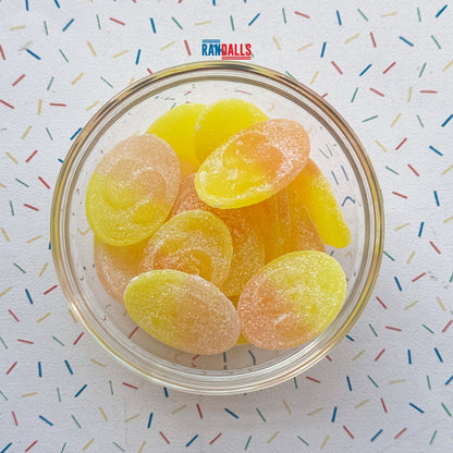 LOVALLS PASSION FRUIT SOUR OVALS - 100g (BRITISH)