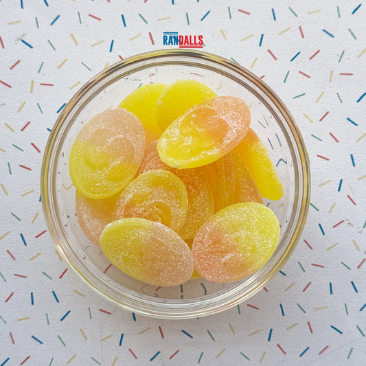 LOVALLS PASSION FRUIT SOUR OVALS - 100g (BRITISH)